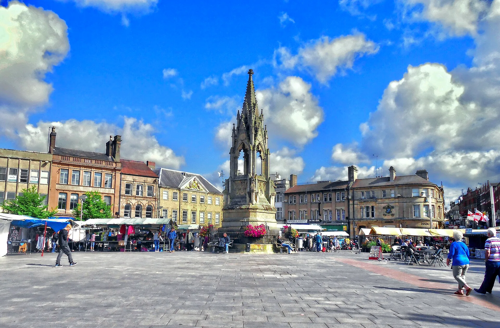 Mansfield - A bright morning for Mansfield's Tuesday market, showing the Bentinck Memorial in the centre of the picture.
