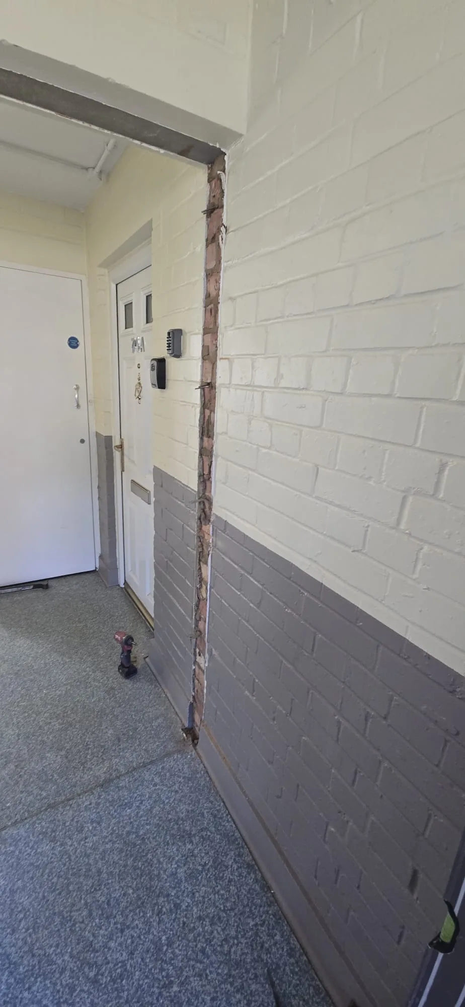 Wall with exposed brick gap ready for fire stopping installation